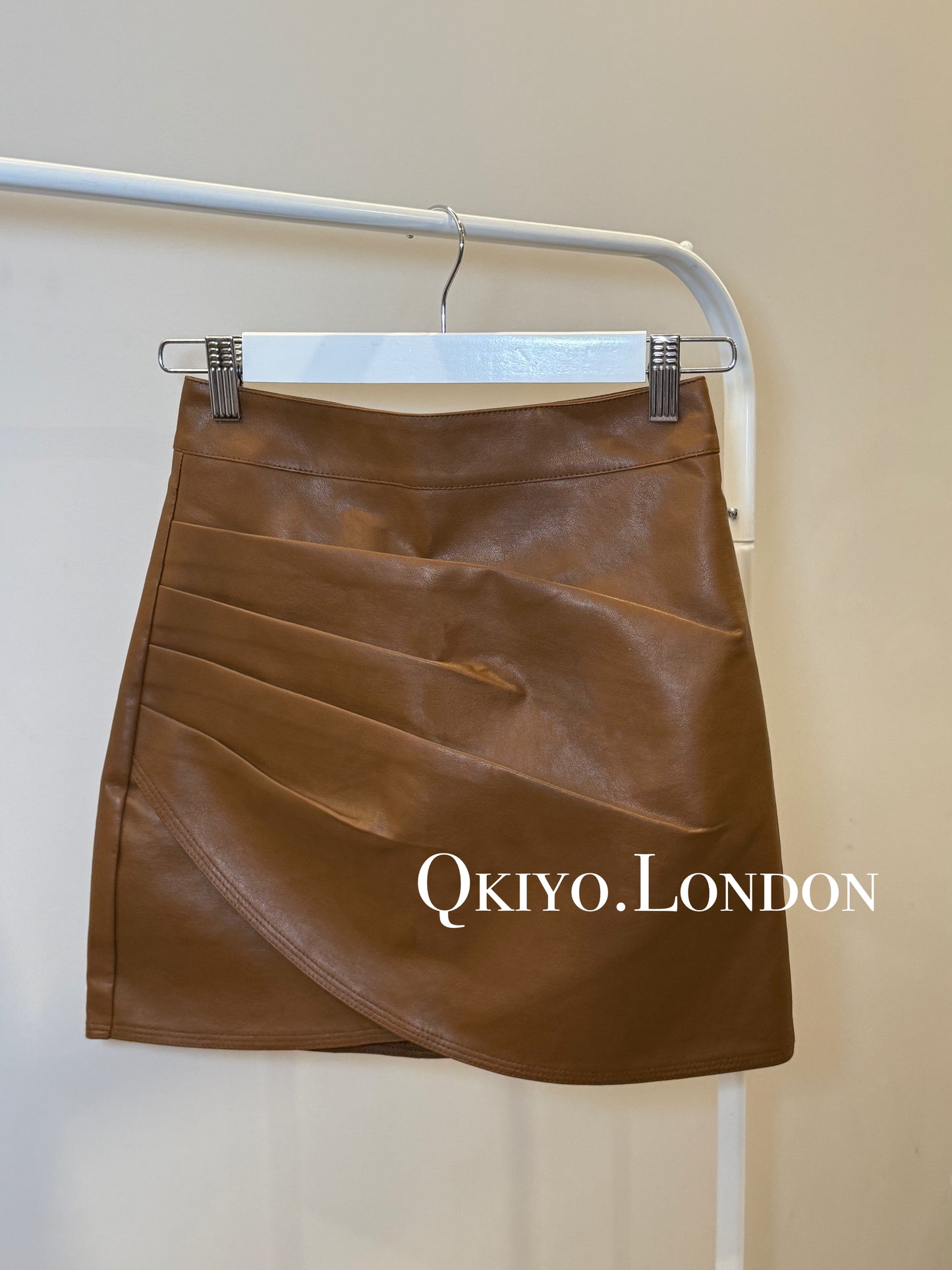 The Sculpted Leather Wrap Skirt
