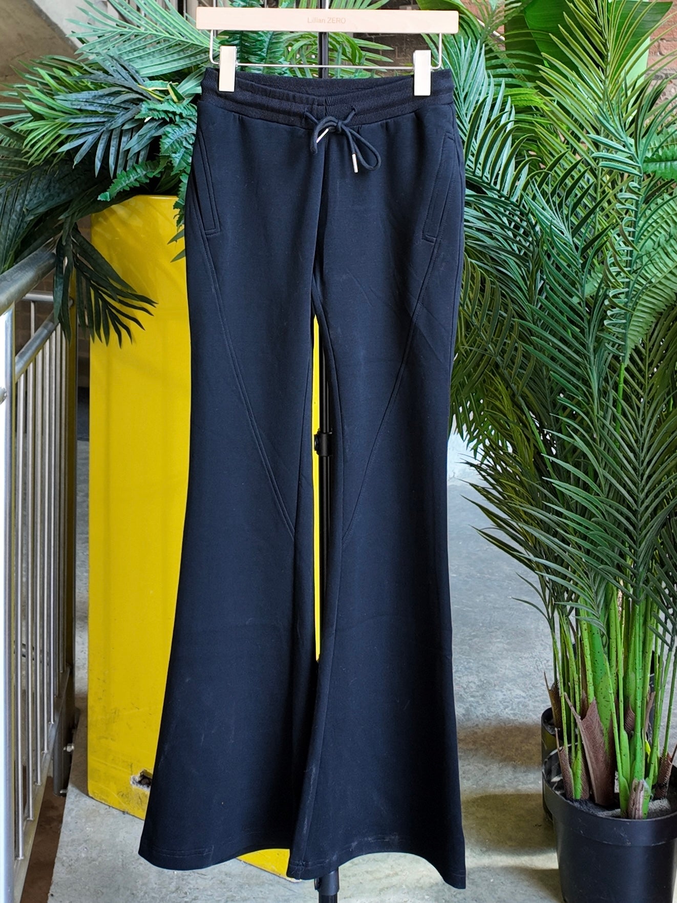 Flared Stretch Trousers in Jet Black