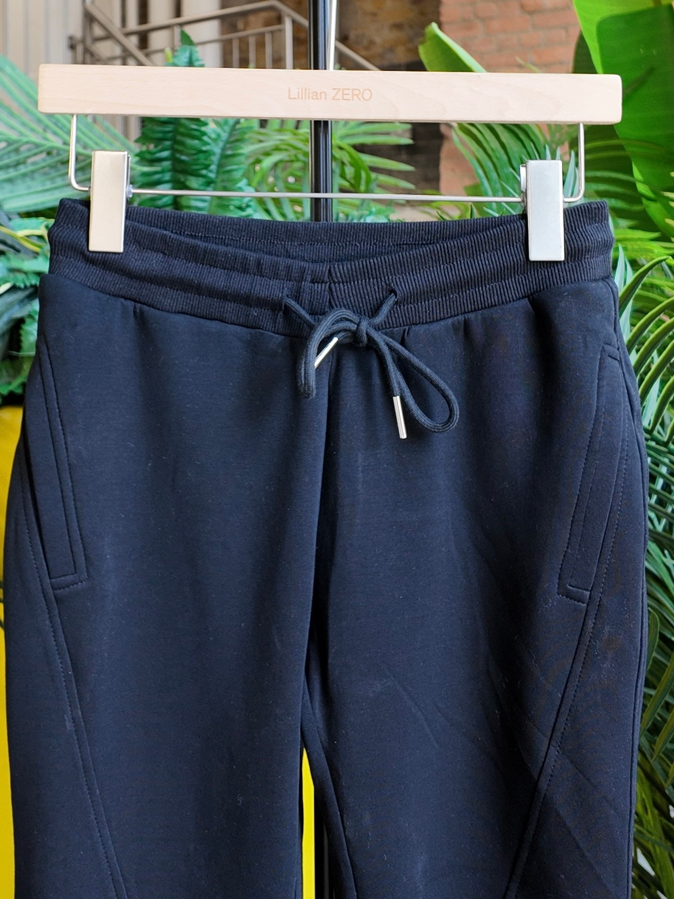 Flared Stretch Trousers in Jet Black